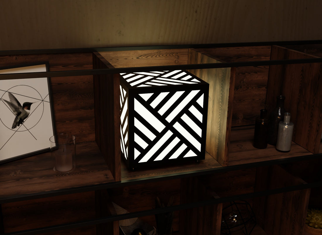 300mm metal cube lamp featuring a diagonal weave cut-out pattern, white plexiglass panels, and a textured black finish.