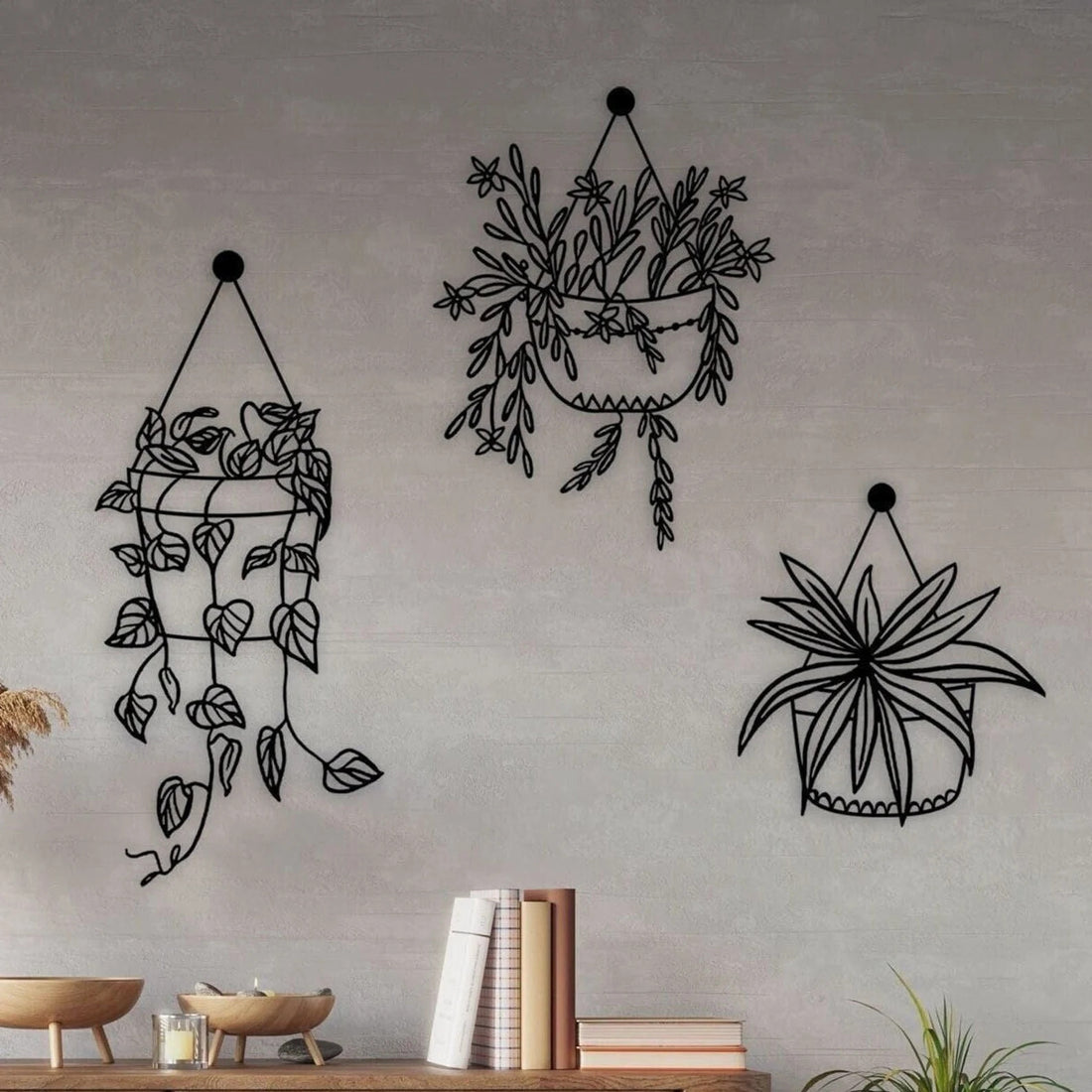 High-quality metal wall art featuring the "Flowers in a Pot Metal Wall Art" crafted from durable steel with a sleek black powder-coated finish.