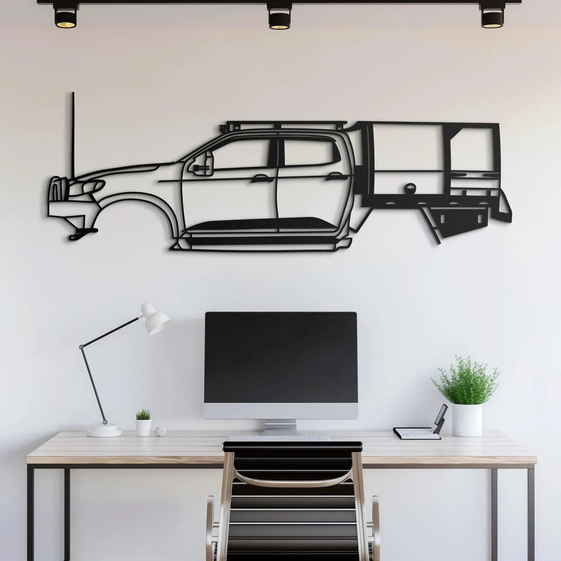 High-quality metal wall art featuring the "Hilux Adventures Metal Wall Art" crafted from durable steel with a sleek black powder-coated finish.