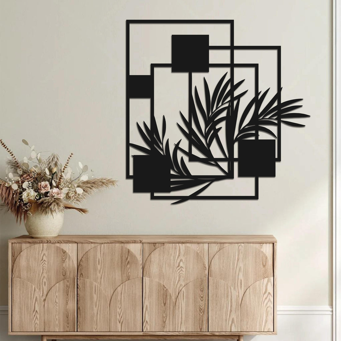 High-quality metal wall art featuring the "Abstract Palm Leaf Metal Wall Art" crafted from durable steel with a sleek black powder-coated finish.