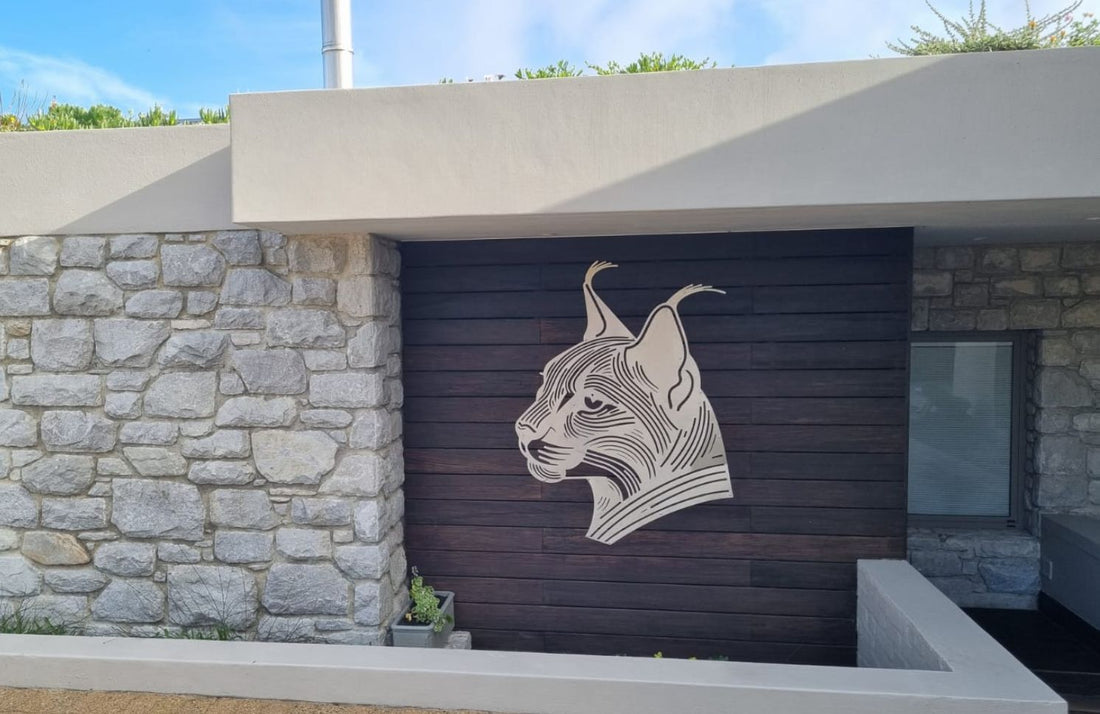 High-quality metal wall art featuring the "Caracal Metal Wall Art" crafted from durable steel with a sleek black powder-coated finish.
