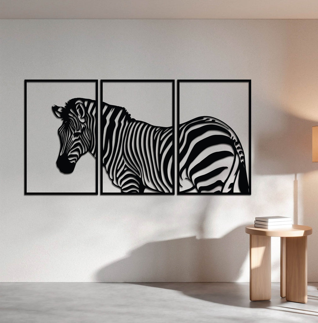 High-quality metal wall art featuring the "Zebra Divided Metal Wall Art" crafted from durable steel with a sleek black powder-coated finish.