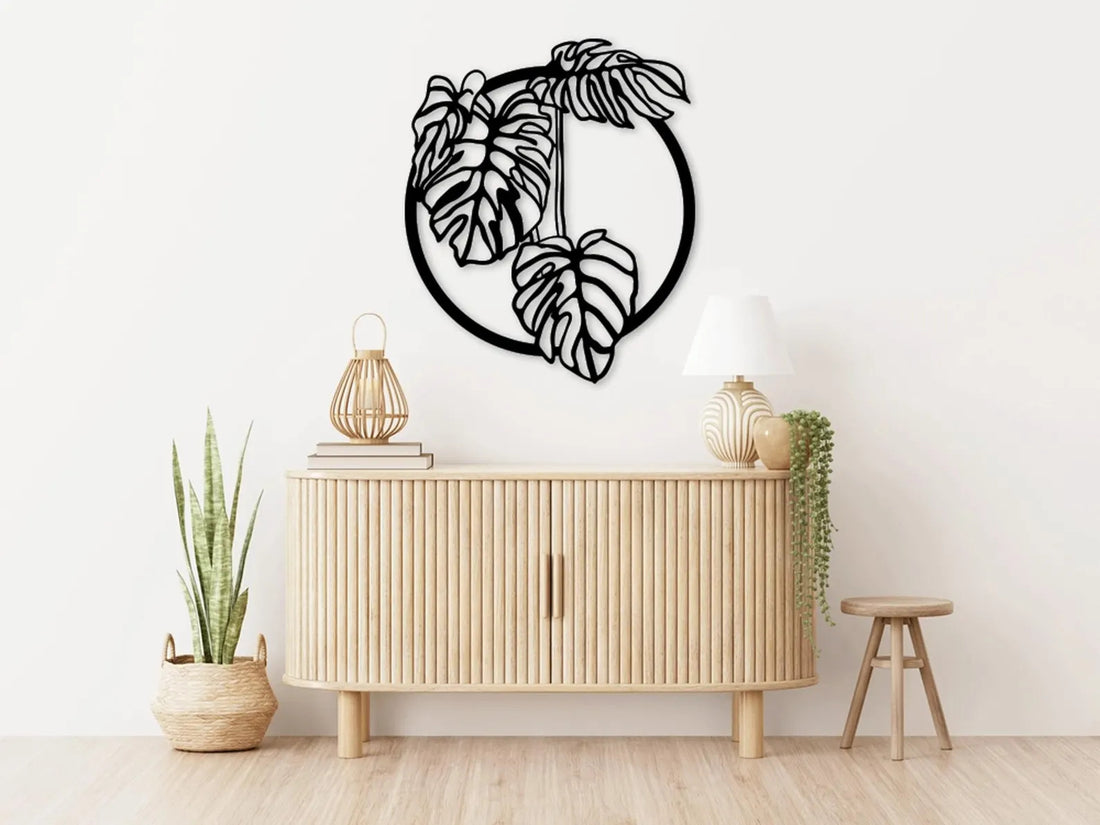 High-quality metal wall art featuring the "Monstera Leaf Metal Wall Art" crafted from durable steel with a sleek black powder-coated finish.