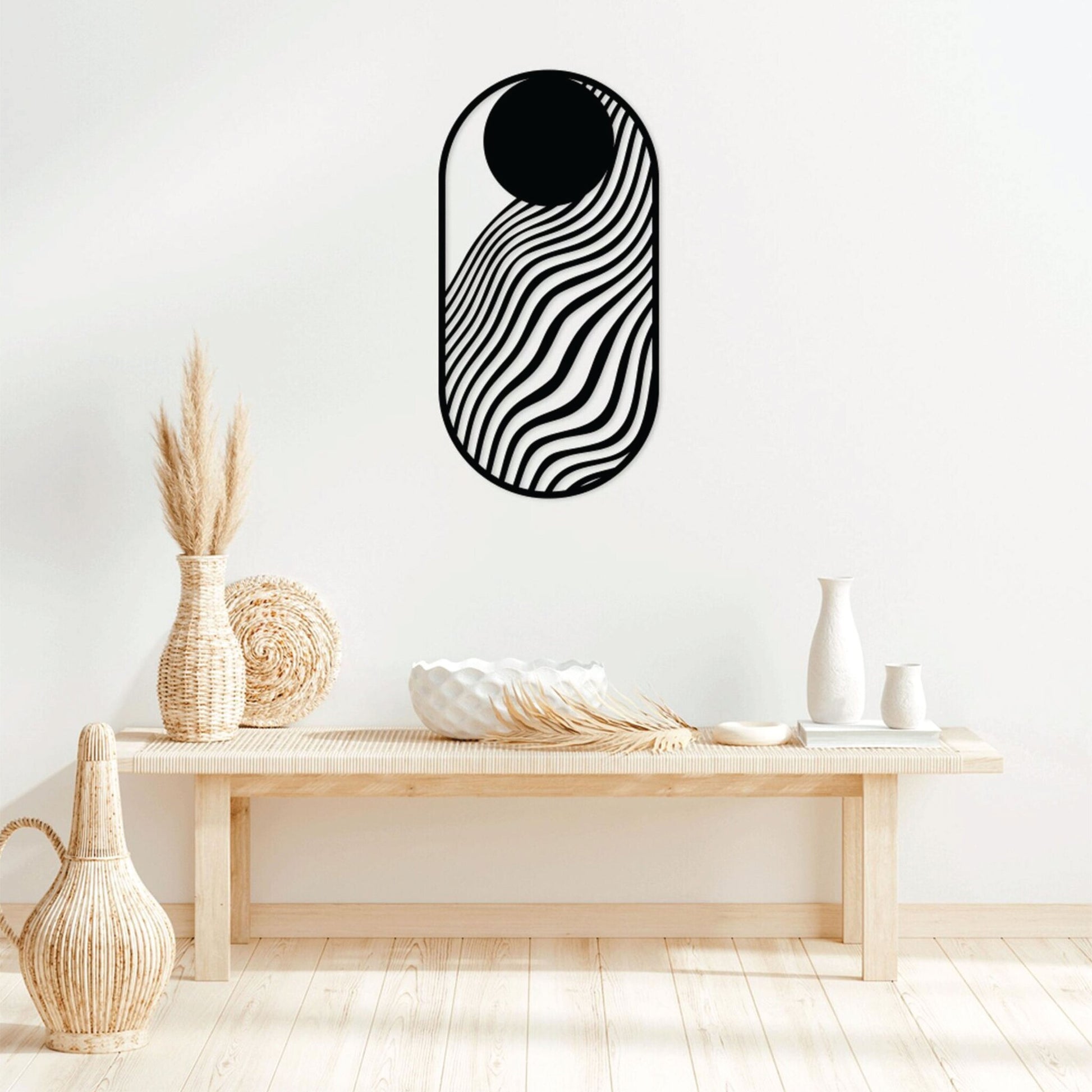High-quality metal wall art featuring the "Abstract Moon Wave Metal Wall Art" crafted from durable steel with a sleek black powder-coated finish.