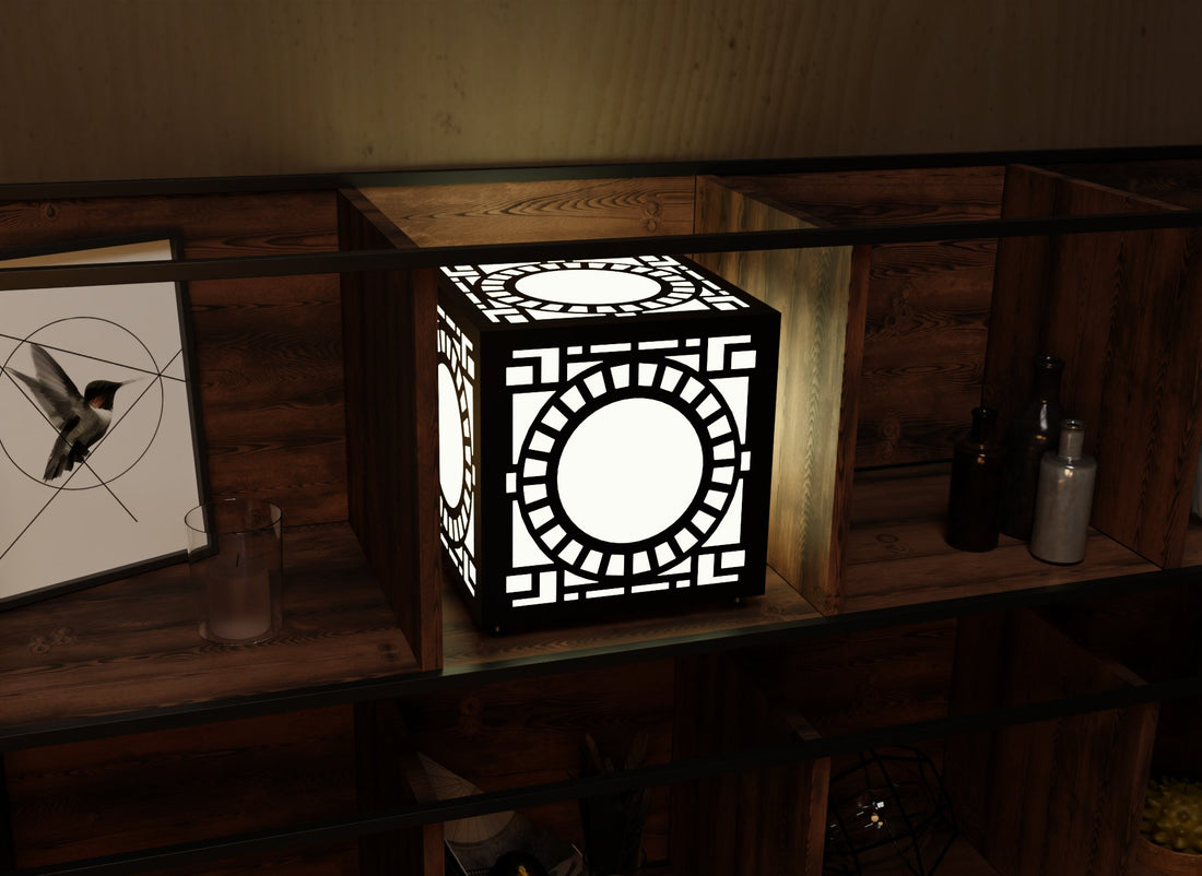 300mm metal cube lamp featuring a solar portal cut-out pattern, white plexiglass panels, and a textured black finish.