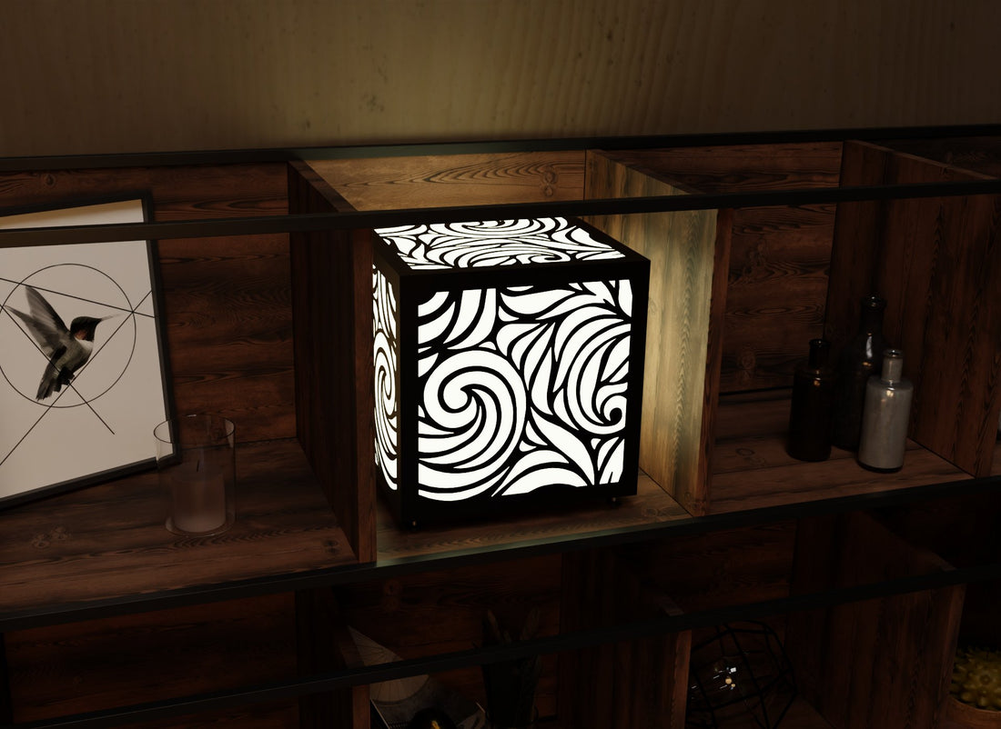 300mm metal cube lamp featuring a swirl breeze cut-out pattern, white plexiglass panels, and a textured black finish.