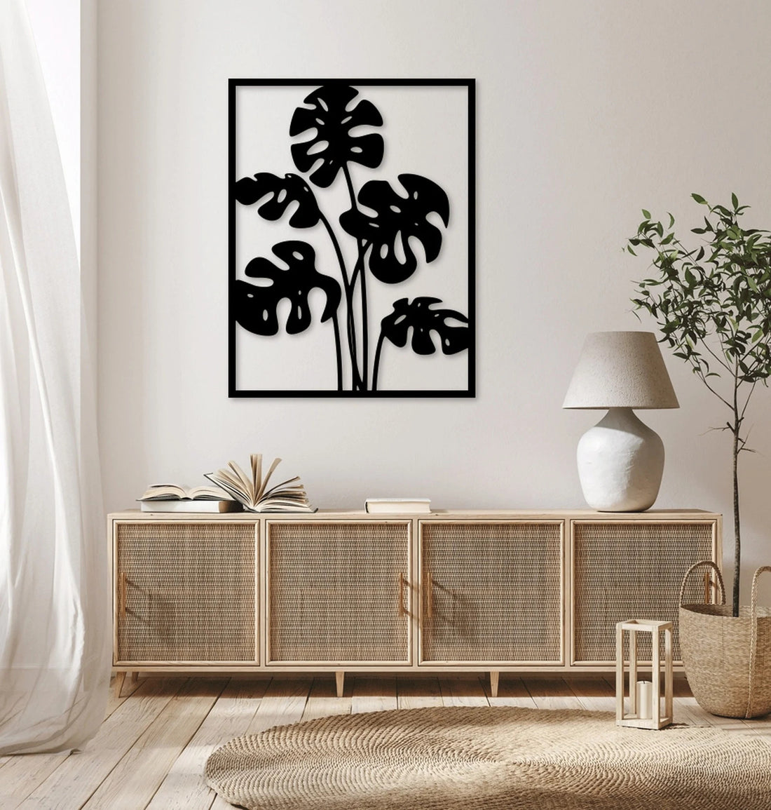 High-quality metal wall art featuring the "Swiss Cheese Plant Metal Wall Art" crafted from durable steel with a sleek black powder-coated finish.