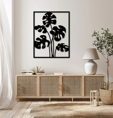 High-quality metal wall art featuring the "Swiss Cheese Plant Metal Wall Art" crafted from durable steel with a sleek black powder-coated finish.