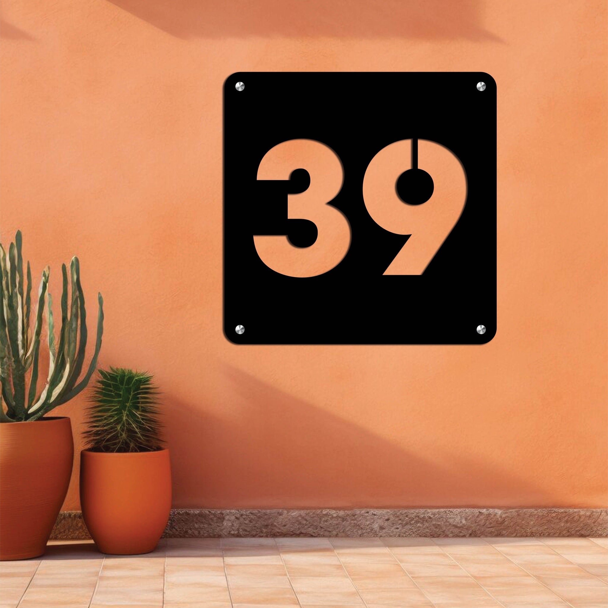 Customizable metal wall art featuring house numbers and address details, crafted from durable, weather-resistant metal with stylish and elegant designs.