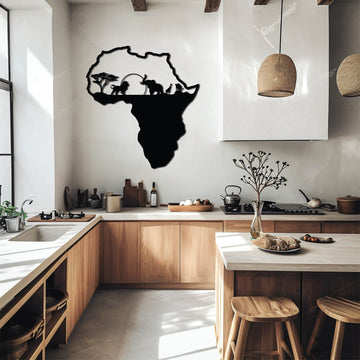 Continent-shaped metal artwork of Africa featuring detailed cutouts of African wildlife, displayed in a modern home setting.