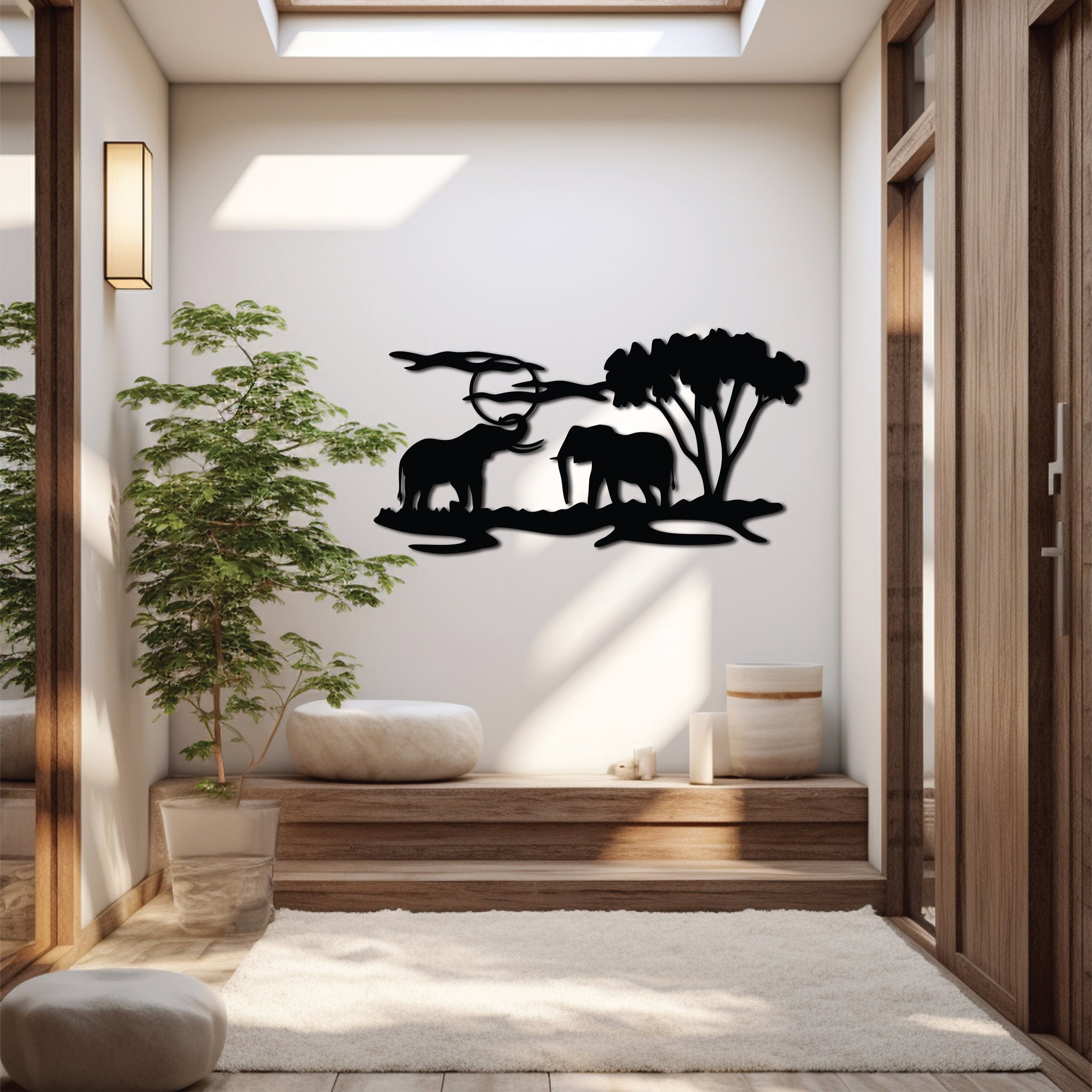 Wide metal wall art depicting two elephants walking past a tree with a vivid sunset in the background, adding elegance to a warm-toned room.