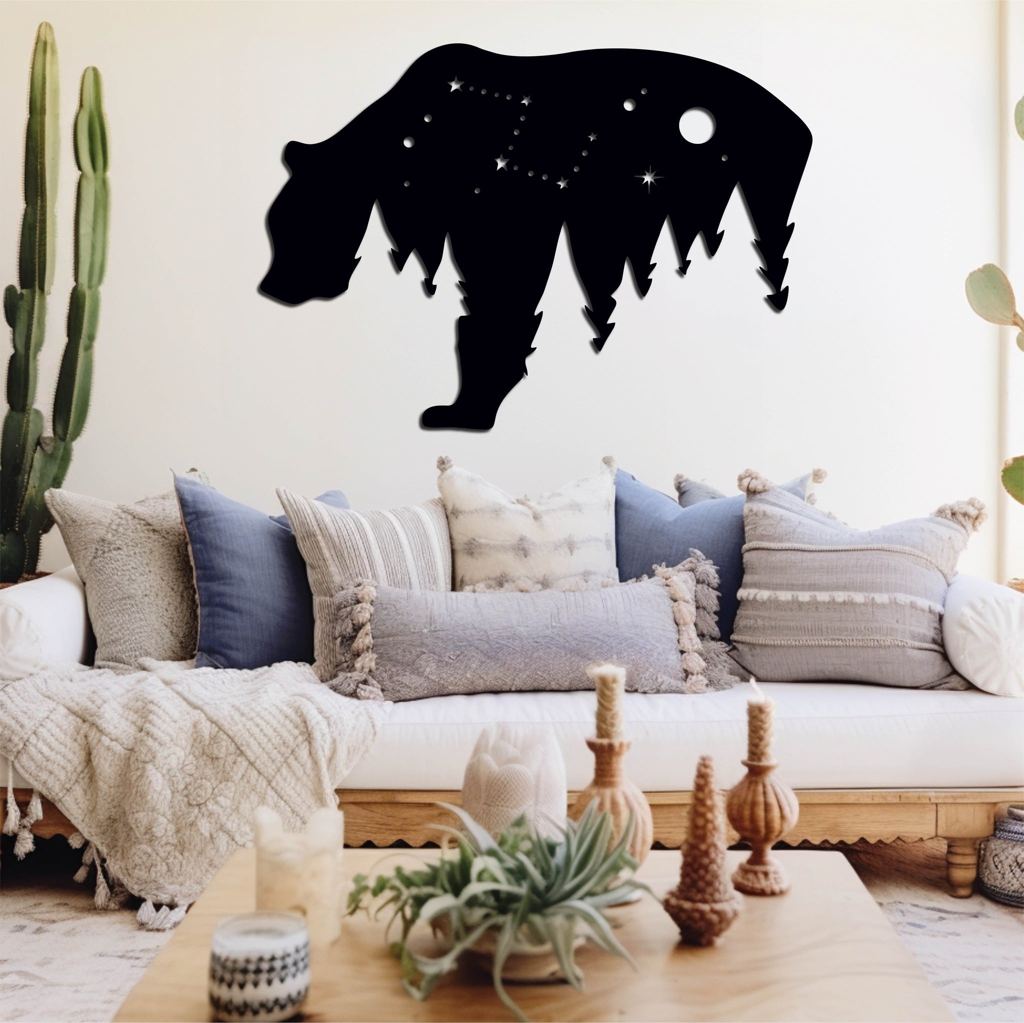 Creative metal wall art featuring a bear gazing at the stars, blending nature and cosmic themes in a modern interior.