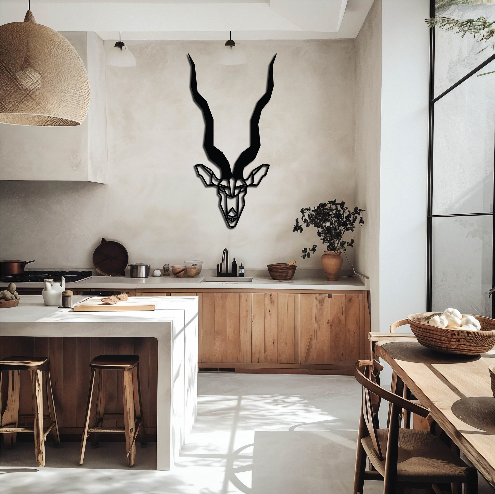 A black metal wall art design depicting a kudu in a geometric art style. Giving it a lovely rustic and aesthetic finish.