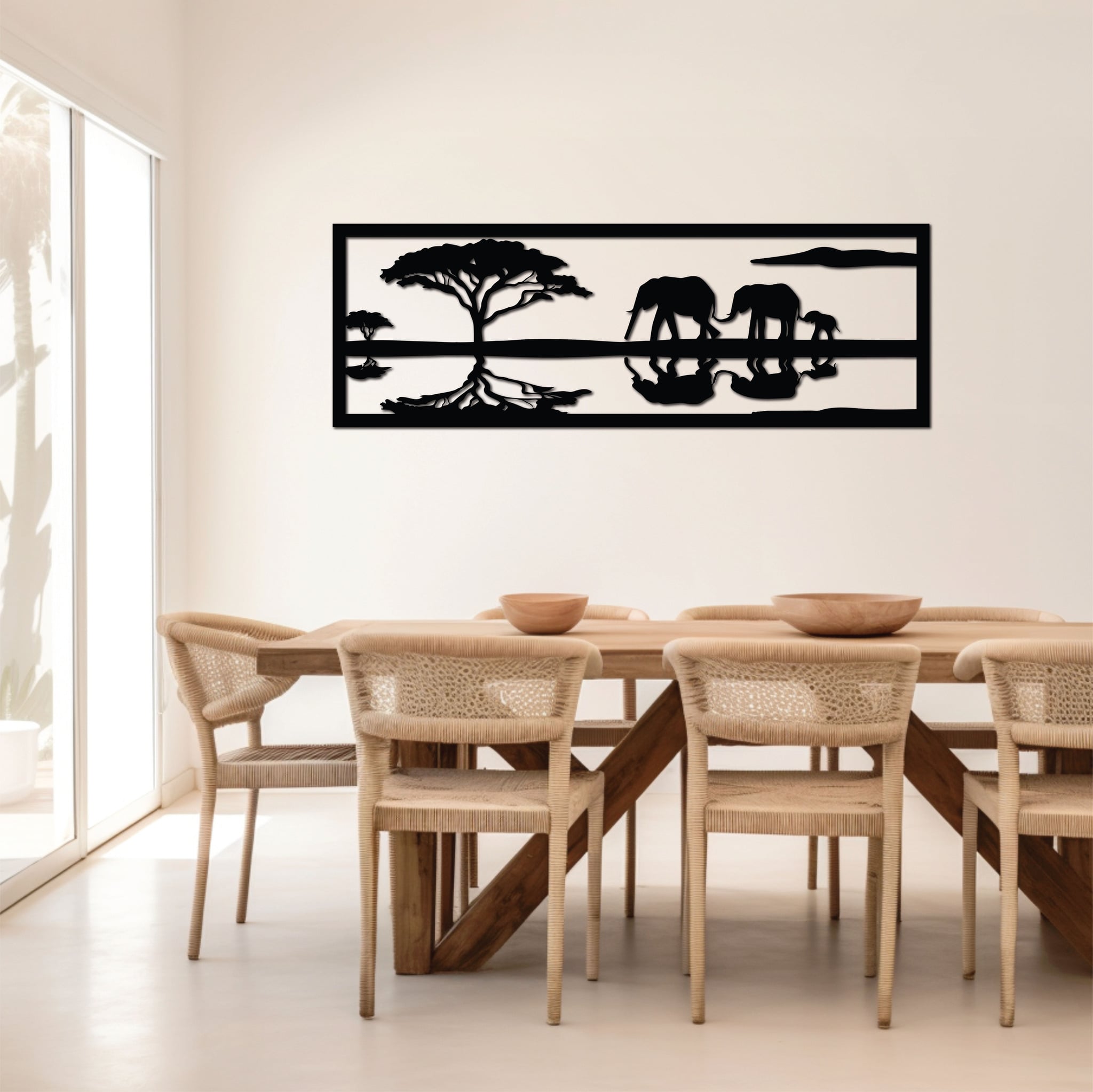 Metal wall art of two elephants walking in a savannah setting, detailed with minimalist lines and naturalistic curves.