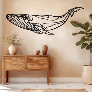 Metal whale wall art featuring a sleek, elegant design perfect for marine life enthusiasts and modern decor.