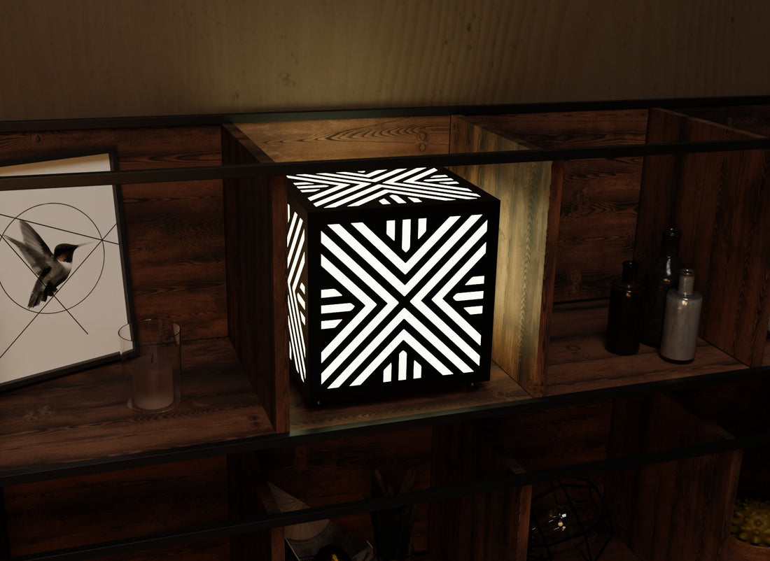 300mm metal cube lamp featuring a chevron cut-out pattern, white plexiglass panels, and a textured black finish.